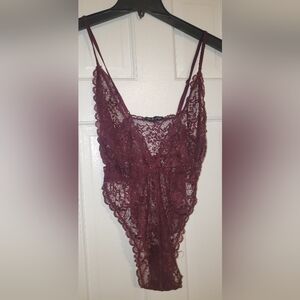 MAROON Lace bodysuit with a deep V-neck and thin straps